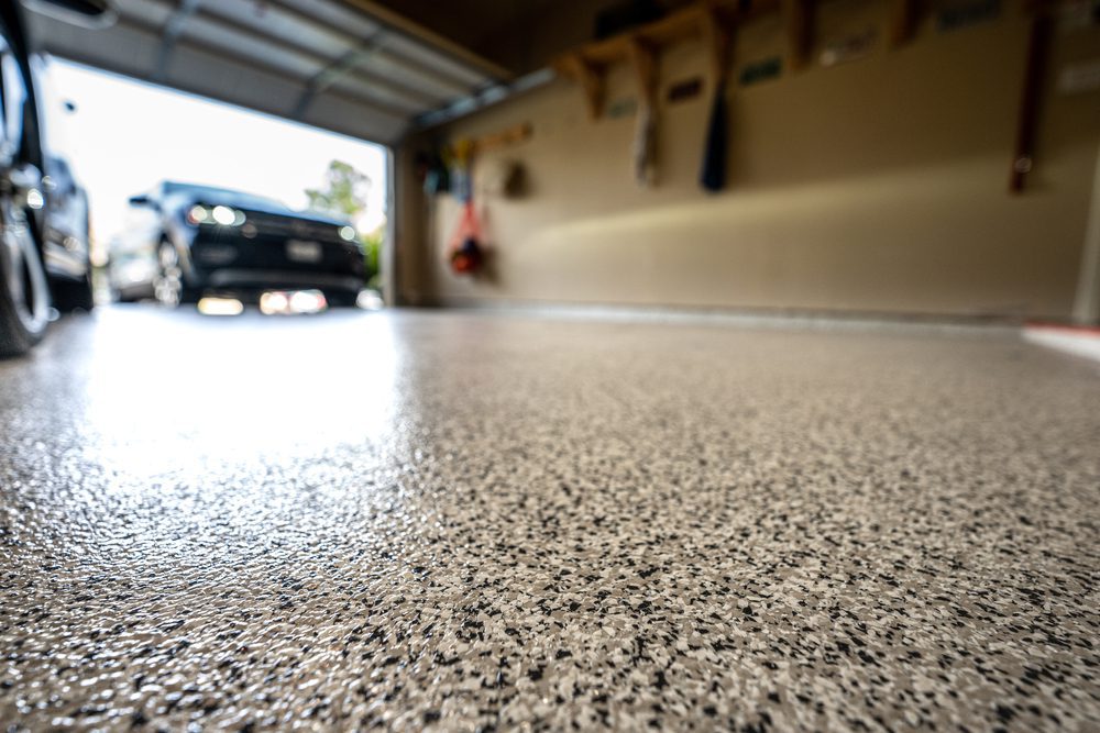 Beautiful epoxy floor installation in Edmonton showing metallic finish and high-gloss coating