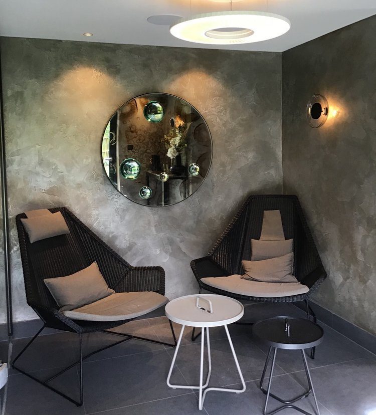 DreamArt Painting artisan expertly applying Venetian plaster in Edmonton